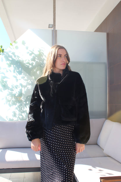 Casaco de pêlo com bolsos