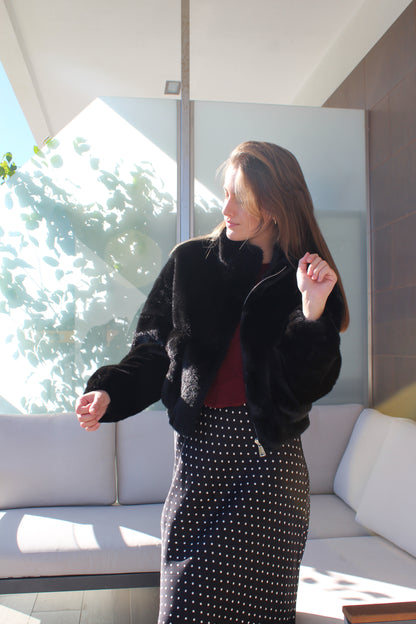 Casaco de pêlo com bolsos