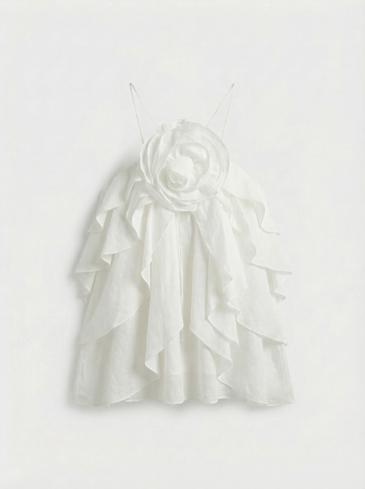 Top com folhos e flor