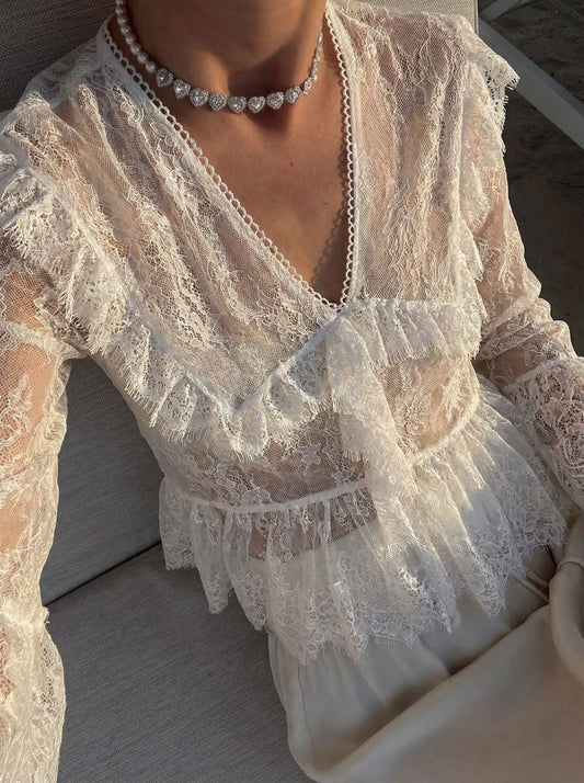 Blusa de renda com mangas